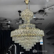 Lustre Junnut 21*E27, cristal et métal, doré